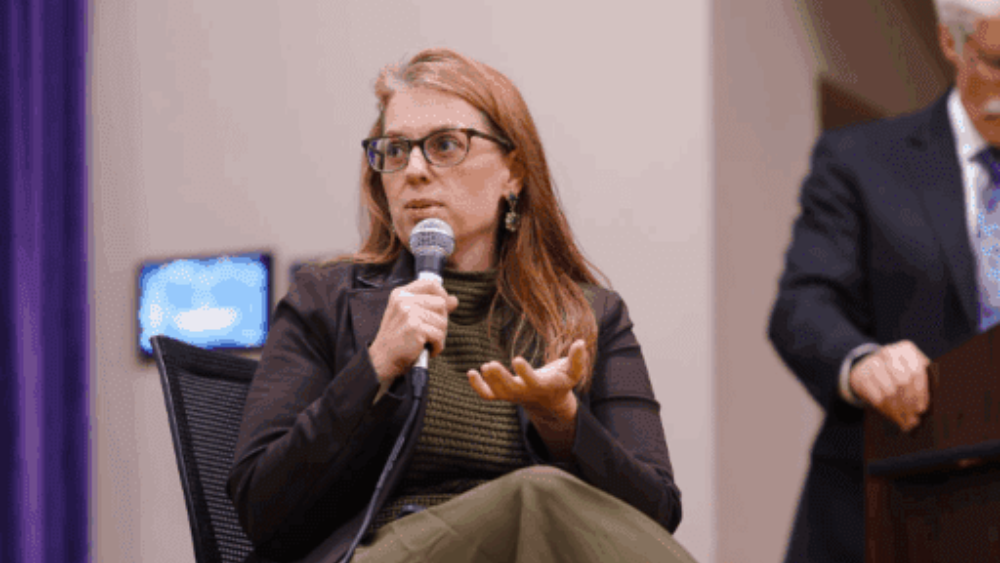 Dr. Elizabeth L'Arrivee at forum